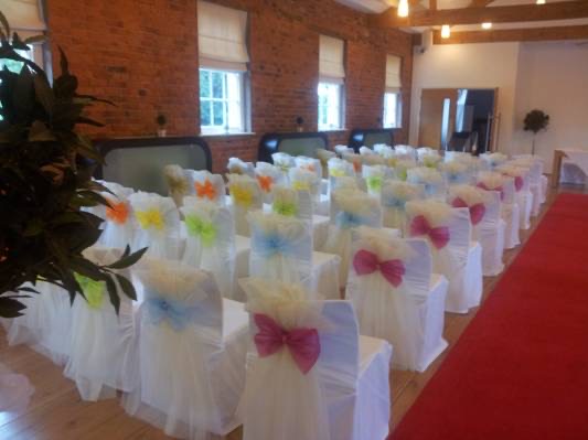 Colourful pastel bows decorating chair covers
